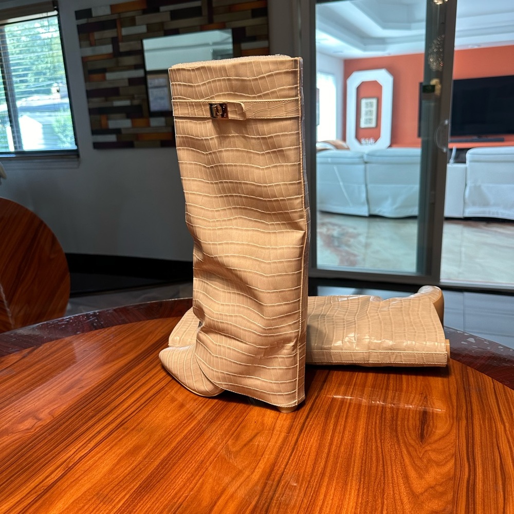 Fashion Nova knee high boots.